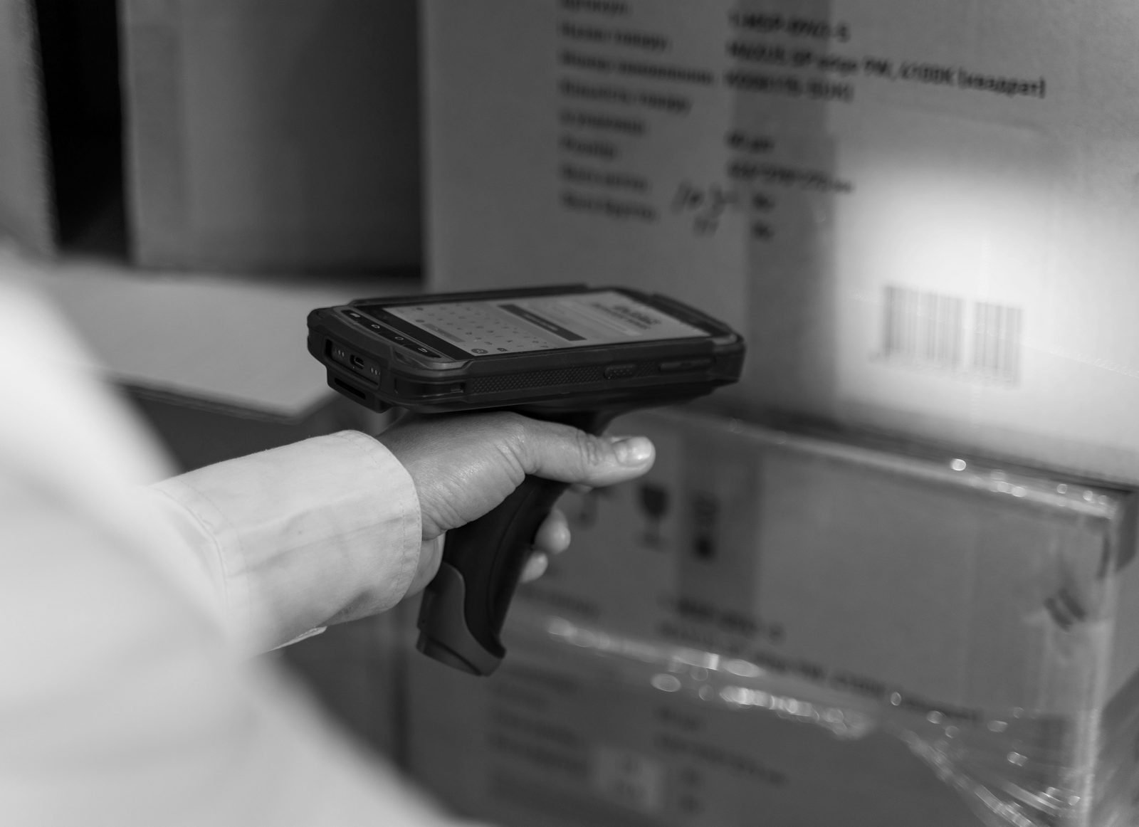 Warehouse operator scanning a shipment barcode