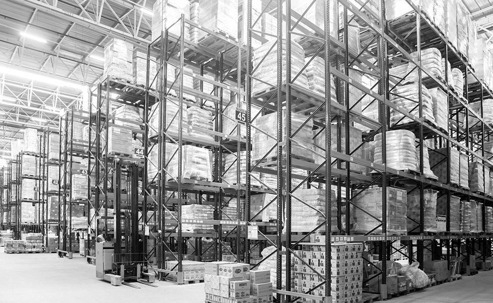 High-bay pallet racking in a Pescador distribution facility